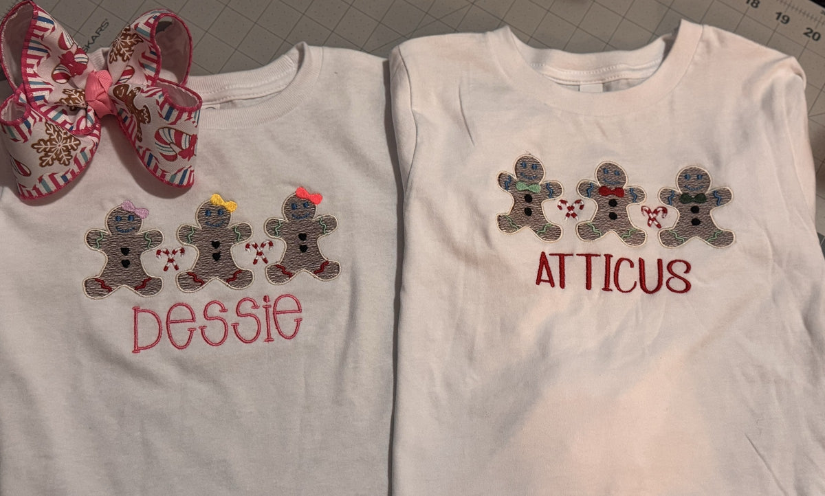 Matching children’s shirts personalized for Bessie and Atticus with gingerbread embroidery
