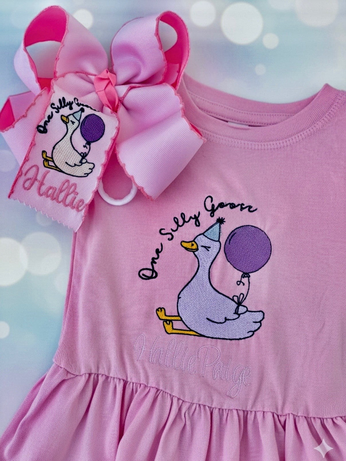 Pink girls outfit with bunny embroidery and coordinating personalized bow