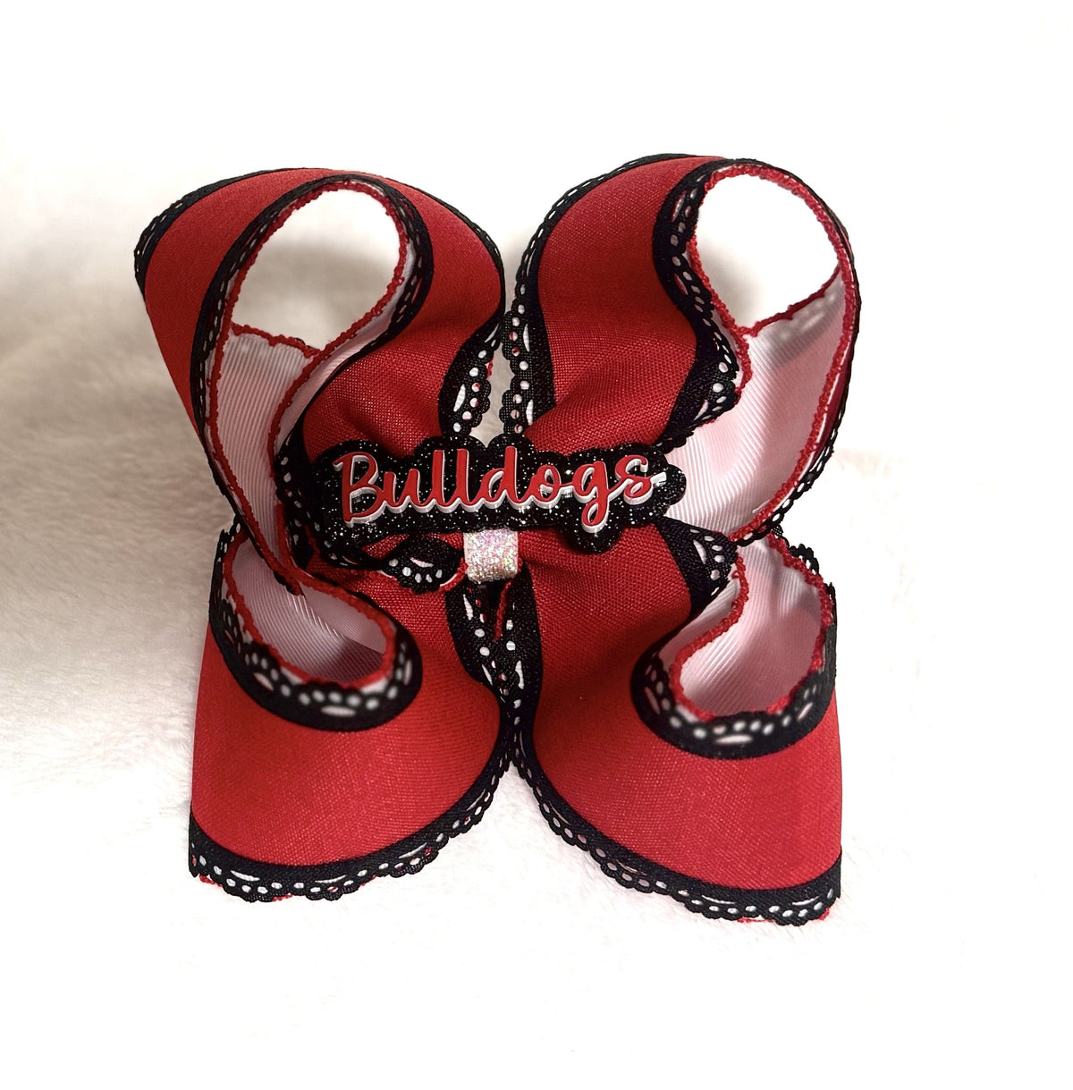 Red black and white Bulldogs spirit bow with personalized center lettering