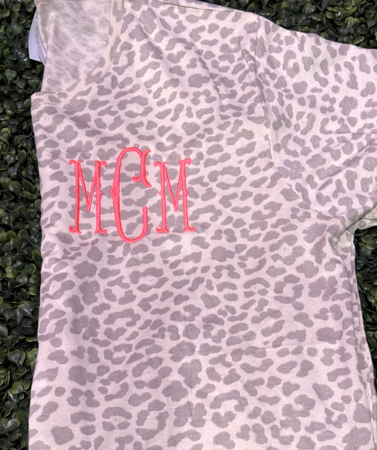 Leopard-print shirt with a red three-letter monogram