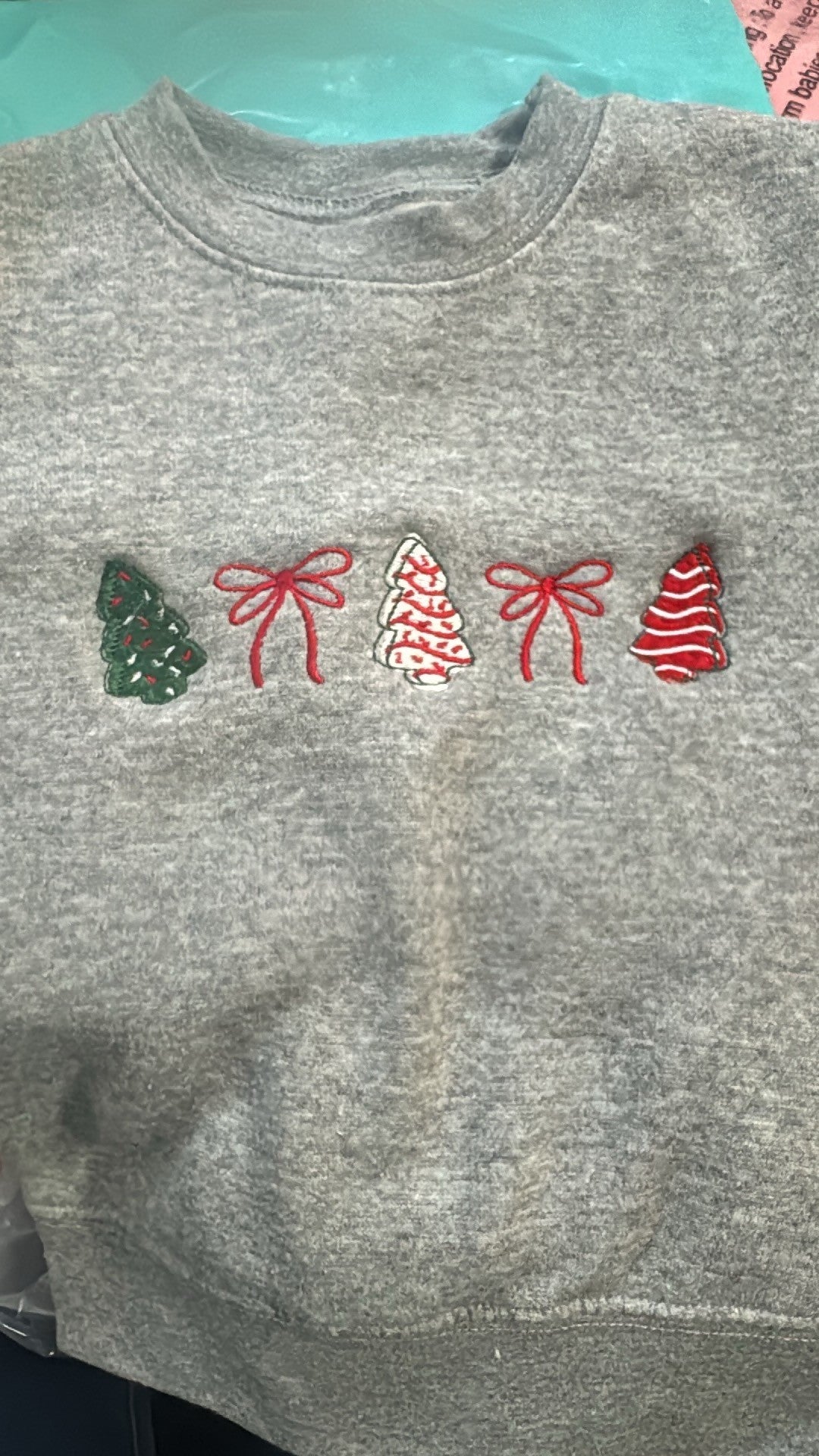 Gray sweatshirt with small embroidered Christmas trees bows and candy canes