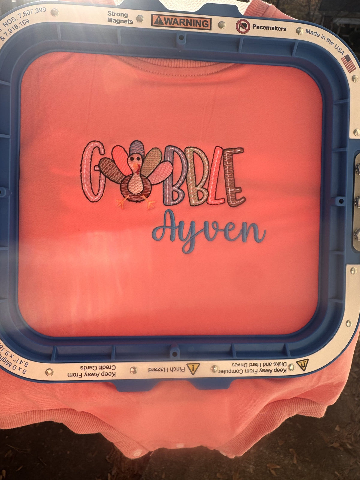 Thanksgiving Gobble name embroidery for Ayven shown in an embroidery hoop