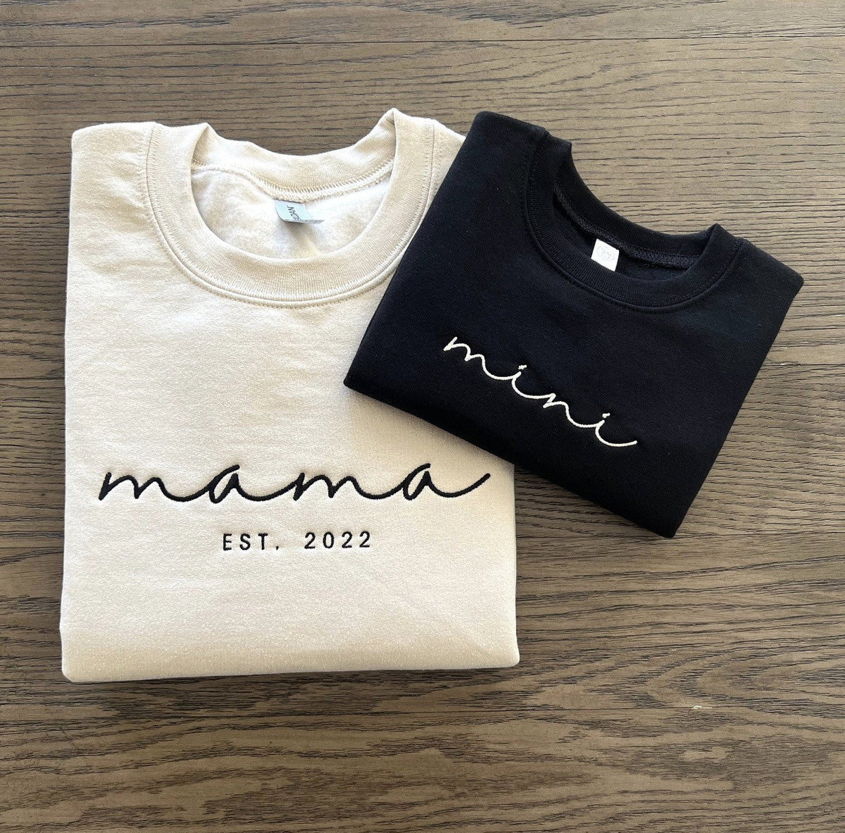 Cream and black family sweatshirts embroidered with MAMA and established-year lettering