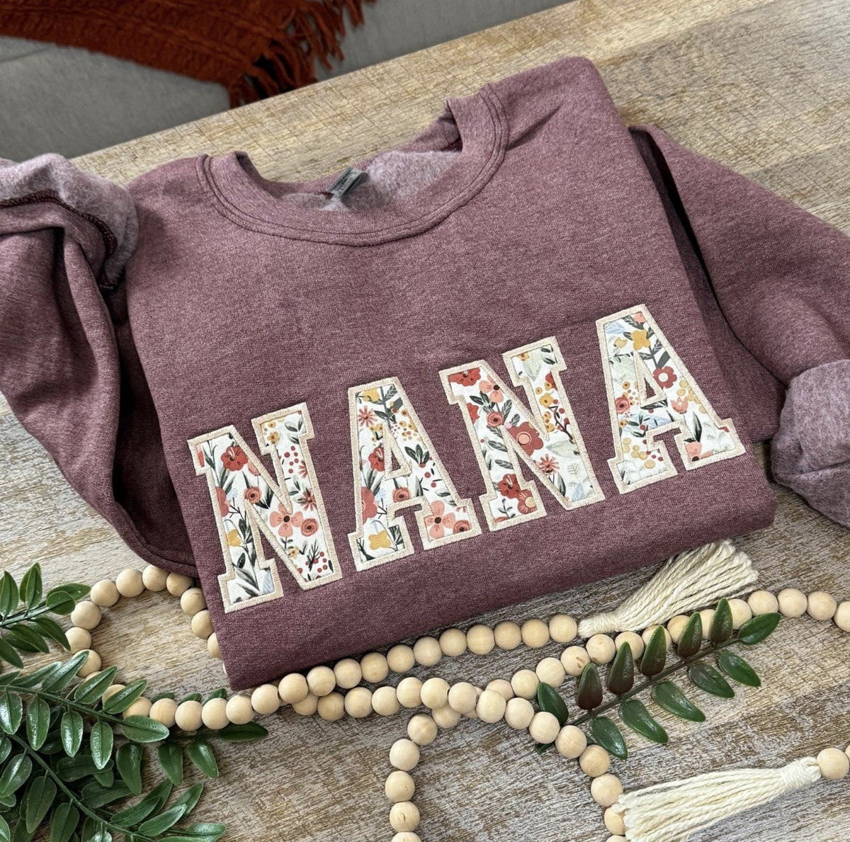 Mauve sweatshirt with large patterned MAMA applique lettering