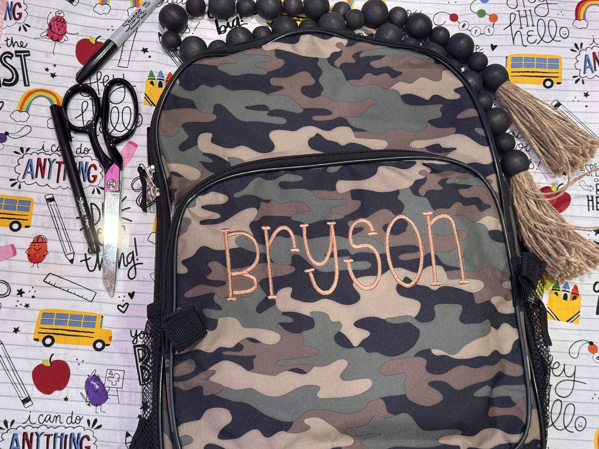 Camouflage backpack personalized with the name Bryson
