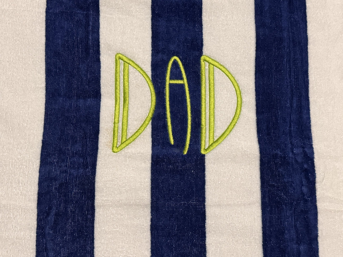 Blue and white striped towel personalized with DAD lettering